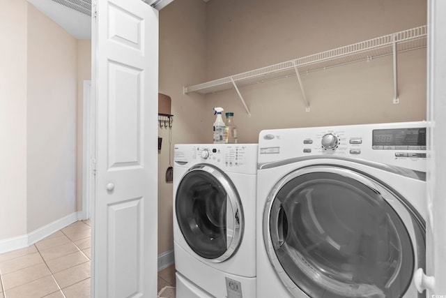 8204 Caddis Ct, Myrtle Beach, SC 29579 - washroom featuring separate washer and dryer and light tile patterned floors