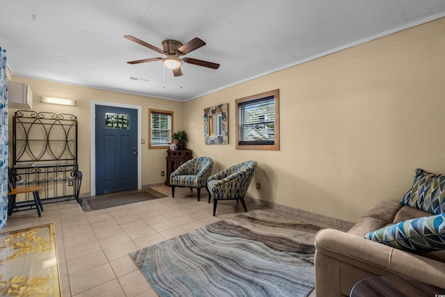 1111 King St, Myrtle Beach, SC 29577 - entryway featuring ceiling fan, light tile patterned floors, and ornamental molding
