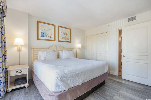 bedroom featuring a closet and wood finished floors