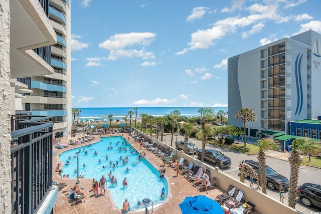 community pool with a water view