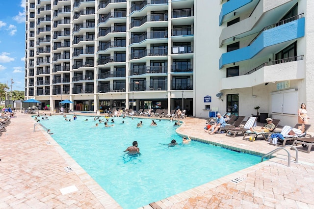 community pool with a patio