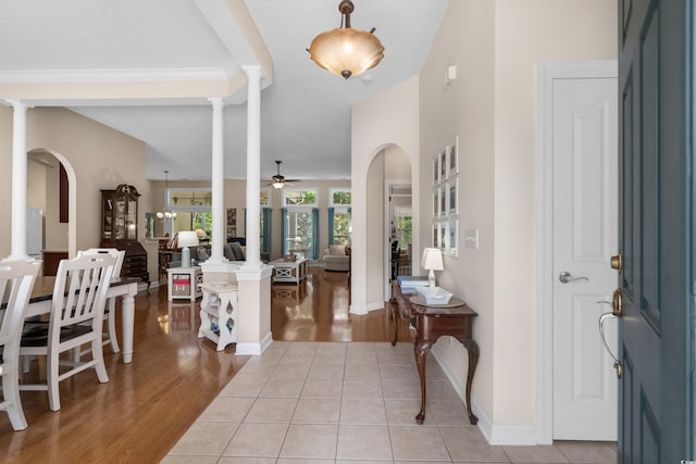 190 Barony Pl, Pawleys Island, SC 29585 - entrance foyer featuring decorative columns, ceiling fan, light wood-type flooring, and baseboards