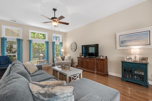 190 Barony Pl, Pawleys Island, SC 29585 - living area featuring healthy amount of natural light, ceiling fan, wood finished floors, and baseboards