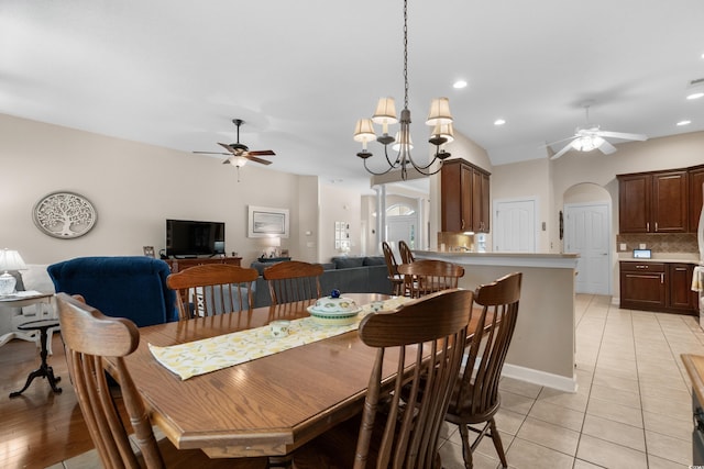 190 Barony Pl, Pawleys Island, SC 29585 - dining room featuring ceiling fan, arched walkways, light tile patterned floors, recessed lighting, and baseboards
