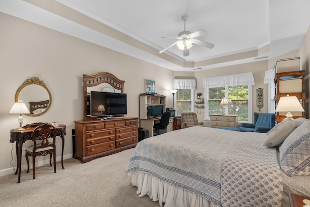190 Barony Pl, Pawleys Island, SC 29585 - carpeted bedroom featuring a tray ceiling, ornamental molding, baseboards, and ceiling fan