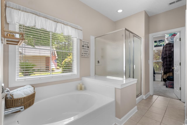 190 Barony Pl, Pawleys Island, SC 29585 - full bathroom featuring a garden tub, a shower stall, and tile patterned flooring
