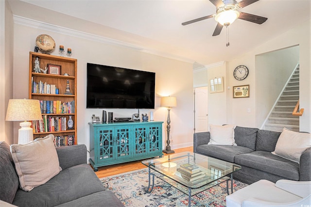 967 Henry James Dr, Myrtle Beach, SC 29579 - living area with ceiling fan, stairway, wood finished floors, crown molding, and baseboards
