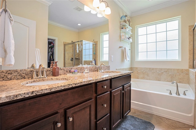 967 Henry James Dr, Myrtle Beach, SC 29579 - full bathroom with a shower stall, tile patterned floors, a garden tub, double vanity, and a walk in closet