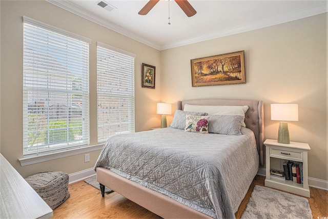 967 Henry James Dr, Myrtle Beach, SC 29579 - bedroom featuring wood finished floors, baseboards, ornamental molding, and ceiling fan