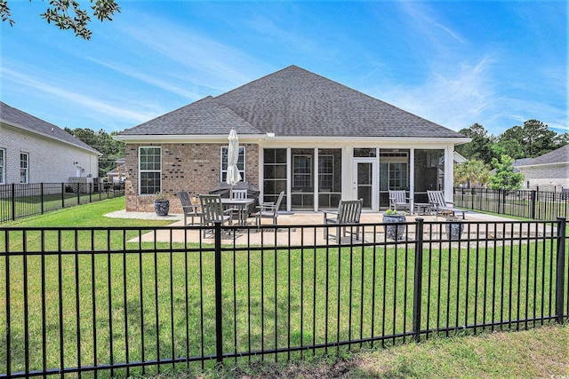 967 Henry James Dr, Myrtle Beach, SC 29579 - back of property featuring a patio, a sunroom, roof with shingles, and brick siding