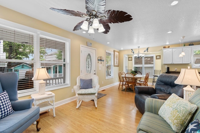 6001 S Kings Hwy, Myrtle Beach, SC 29575 - living area with a chandelier, healthy amount of natural light, baseboards, and recessed lighting
