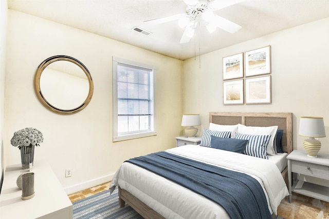 4683 Wild Iris Dr Unit 104, Myrtle Beach, SC 29577 - bedroom with baseboards and ceiling fan