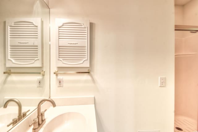 4683 Wild Iris Dr Unit 104, Myrtle Beach, SC 29577 - bathroom featuring radiator heating unit, a shower stall, and vanity