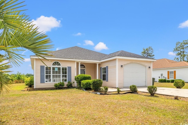 ranch-style home with an attached garage, a front yard, concrete driveway, and a shingled roof