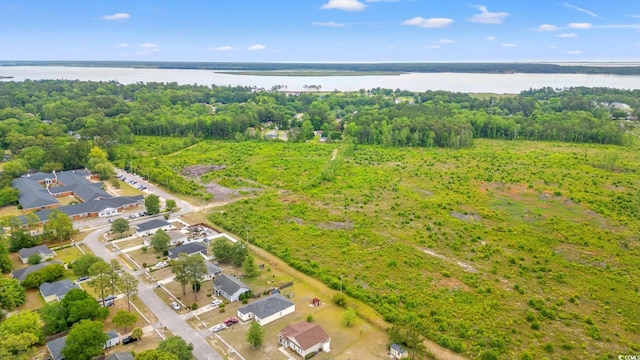 aerial overview of property's location with a nearby body of water