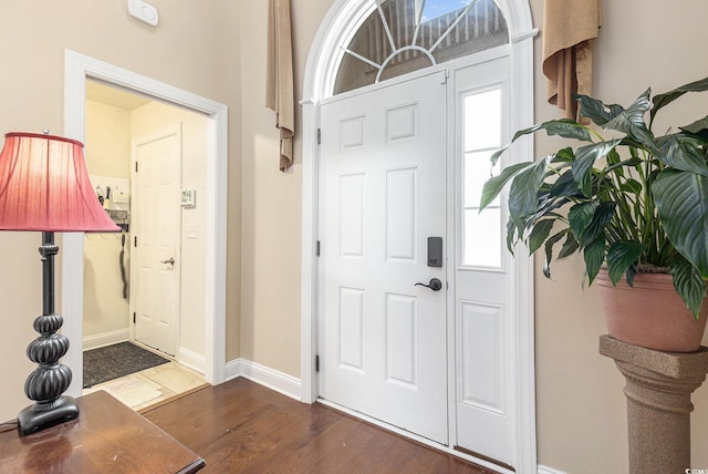 1367 Bermuda Grass Dr, Myrtle Beach, SC 29579 - entrance foyer with dark wood-style flooring and baseboards