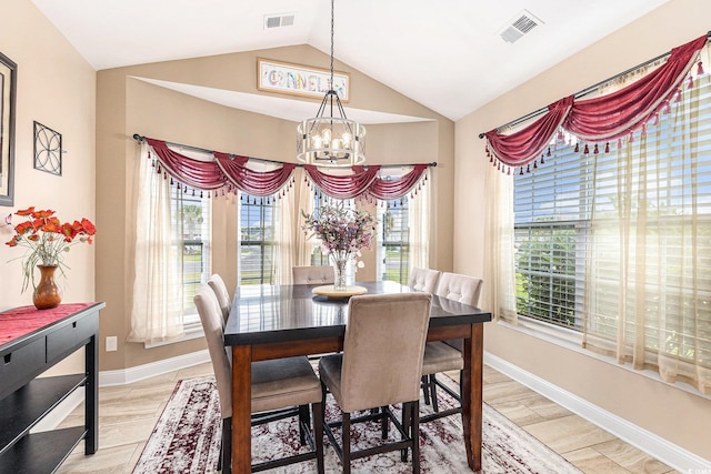 1367 Bermuda Grass Dr, Myrtle Beach, SC 29579 - dining area with lofted ceiling, a chandelier, baseboards, and light wood-type flooring
