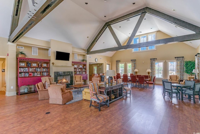 1367 Bermuda Grass Dr, Myrtle Beach, SC 29579 - living area featuring a fireplace, wood finished floors, high vaulted ceiling, and baseboards