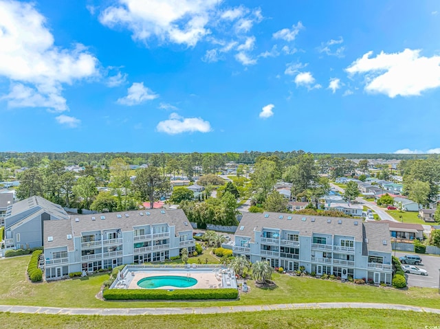 aerial view of residential area with a pool area