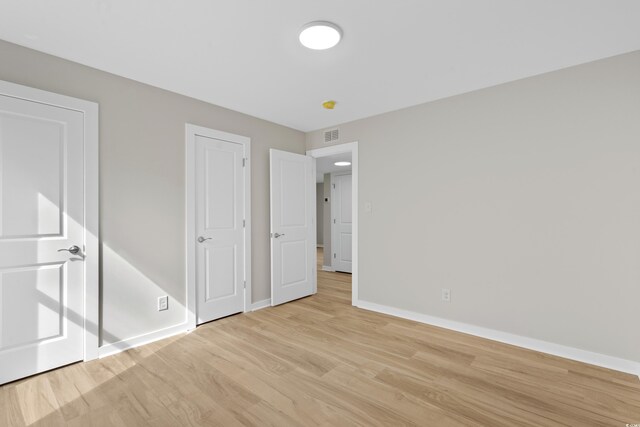 1015 Elm St Unit 4, Conway, SC 29526 - unfurnished bedroom featuring light wood finished floors and baseboards