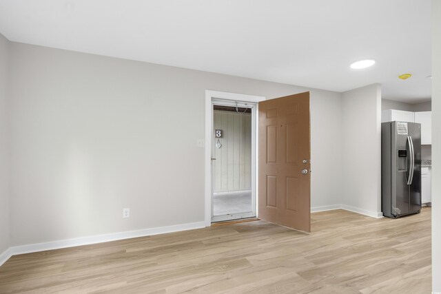 1015 Elm St Unit 4, Conway, SC 29526 - spare room featuring light wood-type flooring and baseboards