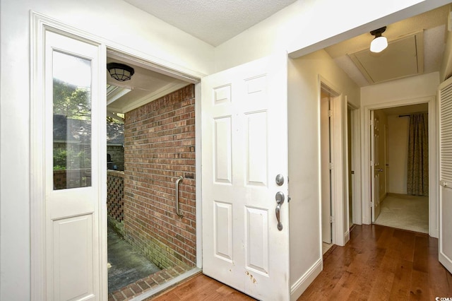 816 Kittiwake Ln, Murrells Inlet, SC 29576 - hallway with wood finished floors, brick wall, and baseboards