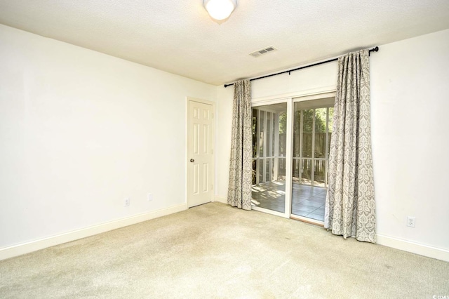 816 Kittiwake Ln, Murrells Inlet, SC 29576 - carpeted empty room featuring baseboards and a textured ceiling