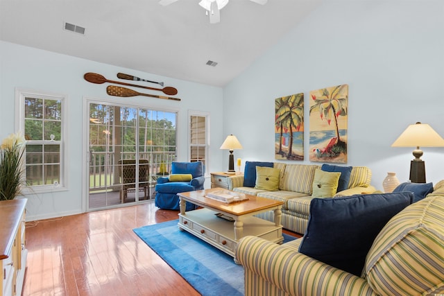 5840 Longwood Dr Unit 303, Murrells Inlet, SC 29576 - living room featuring a ceiling fan, hardwood / wood-style flooring, high vaulted ceiling, and baseboards