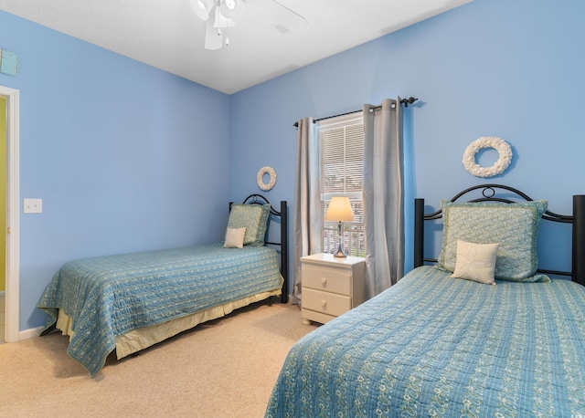 5840 Longwood Dr Unit 303, Murrells Inlet, SC 29576 - carpeted bedroom featuring a ceiling fan