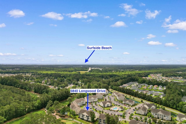 drone / aerial view of a heavily wooded area