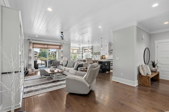 4832 Williams Island Dr, Little River, SC 29566 - living area featuring recessed lighting, dark wood-style floors, ornamental molding, and baseboards