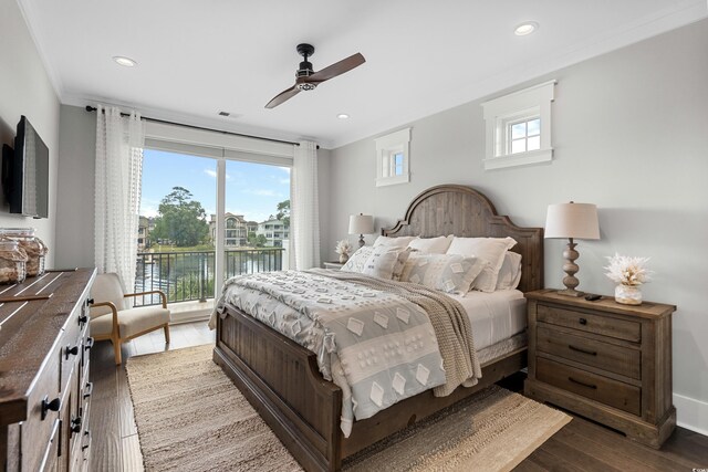 4832 Williams Island Dr, Little River, SC 29566 - bedroom featuring access to outside, multiple windows, a water view, wood-type flooring, and recessed lighting