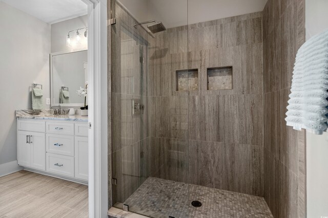 4832 Williams Island Dr, Little River, SC 29566 - bathroom featuring a tile shower and vanity
