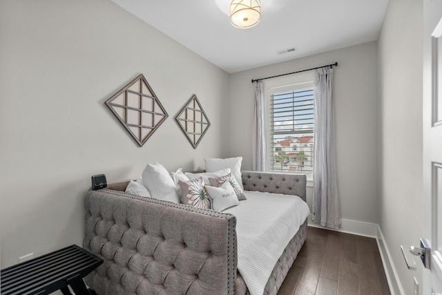 4832 Williams Island Dr, Little River, SC 29566 - bedroom featuring dark wood-type flooring and baseboards