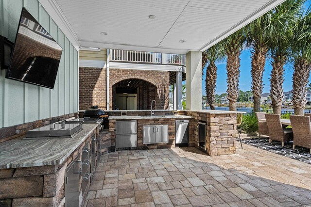 4832 Williams Island Dr, Little River, SC 29566 - view of patio / terrace with exterior kitchen, a balcony, a grill, a sink, and a residential view