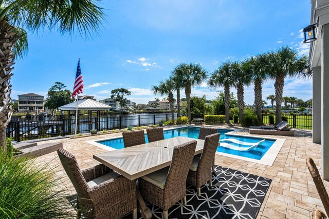 4832 Williams Island Dr, Little River, SC 29566 - view of swimming pool featuring a gazebo, a patio area, fence, and a water view