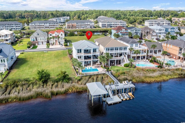 4832 Williams Island Dr, Little River, SC 29566 - aerial perspective of suburban area with a pool and a nearby body of water