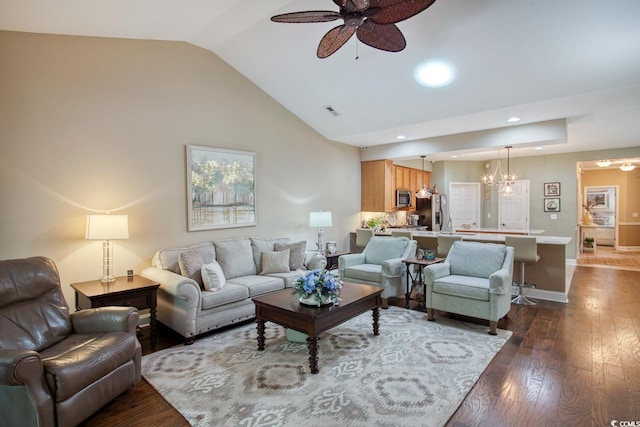 living room with a chandelier, dark wood-style floors, a ceiling fan, baseboards, and high vaulted ceiling