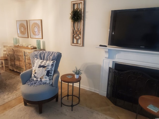 306 Westbury Ct Unit 2-B, Myrtle Beach, SC 29572 - living area featuring a fireplace, baseboards, and tile patterned floors