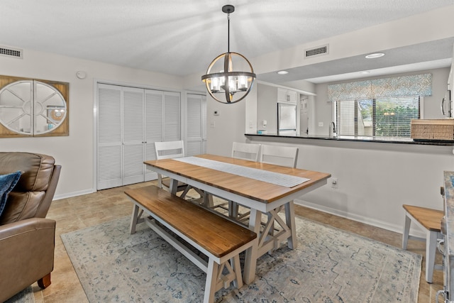 306 Westbury Ct Unit 2-B, Myrtle Beach, SC 29572 - dining space featuring a chandelier and baseboards