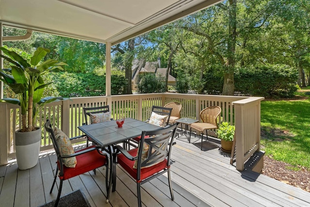 306 Westbury Ct Unit 2-B, Myrtle Beach, SC 29572 - wooden terrace featuring outdoor dining area and view of scattered trees