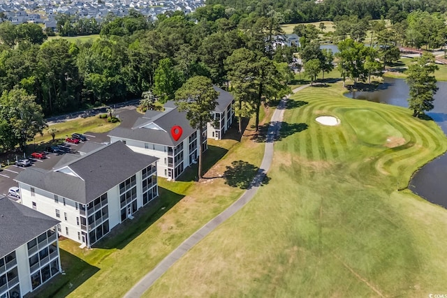 drone / aerial view of a large body of water and a golf club