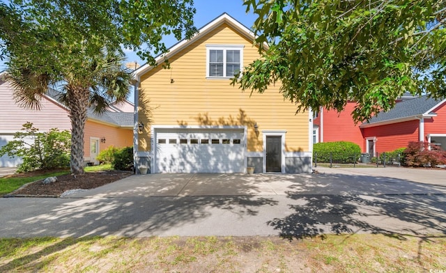1516 James Island Ave, North Myrtle Beach, SC 29582 - traditional-style house featuring a garage and concrete driveway