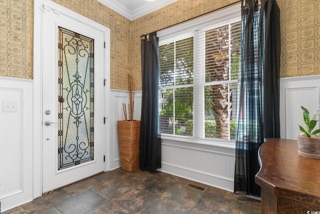 1516 James Island Ave, North Myrtle Beach, SC 29582 - entrance foyer featuring wallpapered walls, wainscoting, dark stone finish floors, and a decorative wall