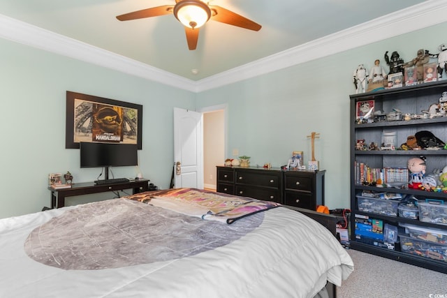 bedroom featuring ornamental molding, carpet, and a ceiling fan