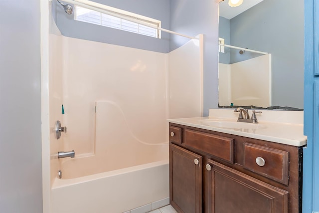 bathroom with washtub / shower combination and vanity
