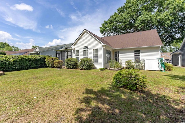 view of front of home featuring a front lawn