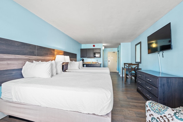 1501 S Ocean Blvd Unit 501, Myrtle Beach, SC 29577 - bedroom featuring dark wood-style flooring