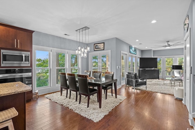 600 48th Ave S Unit 201, North Myrtle Beach, SC 29582 - dining area with dark wood-type flooring, ceiling fan, recessed lighting, a chandelier, and baseboards