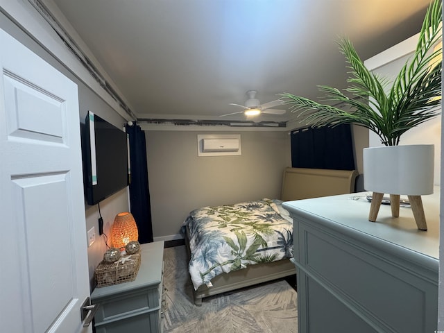 bedroom with baseboards and a ceiling fan